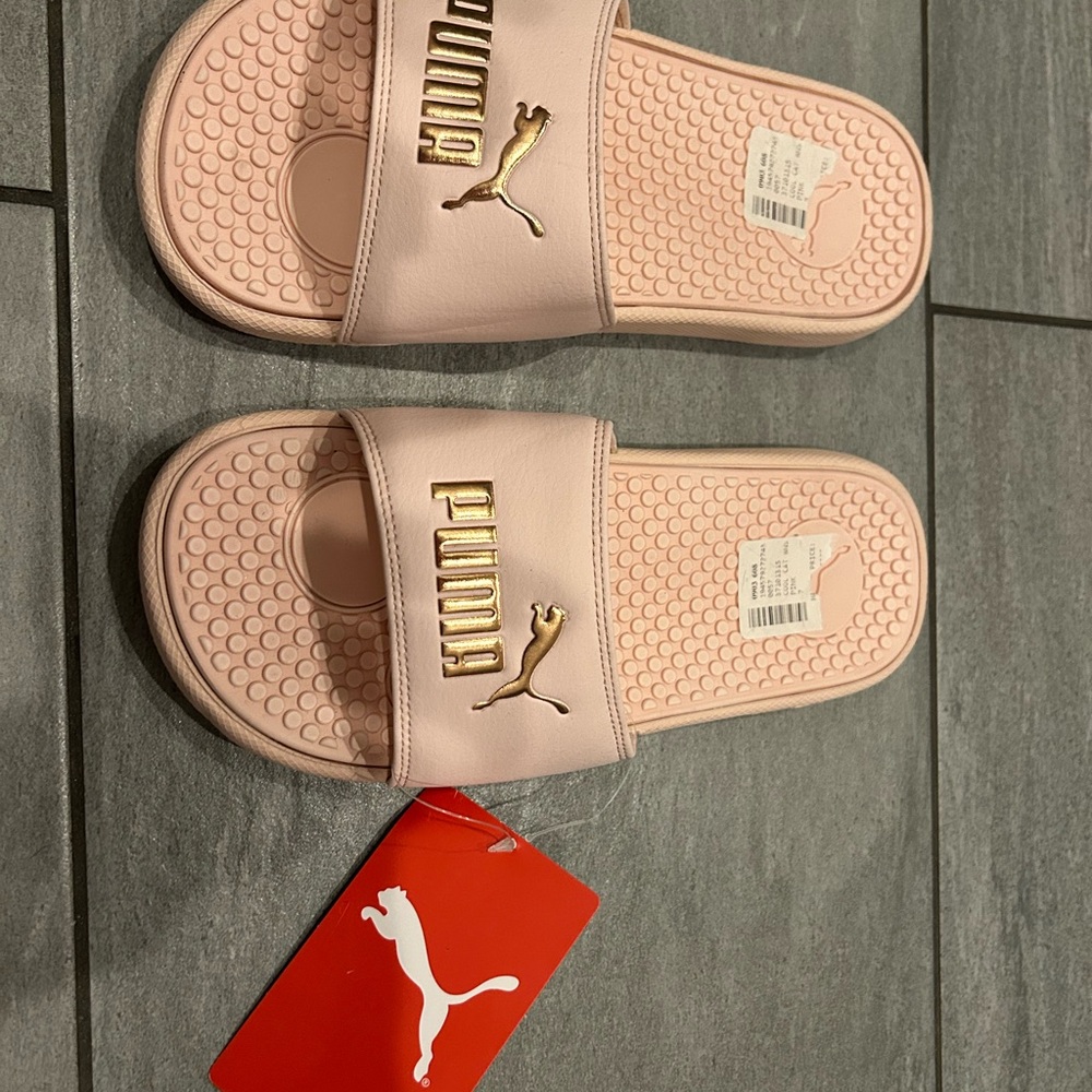 Puma Light Pink Slides with Gold Accents